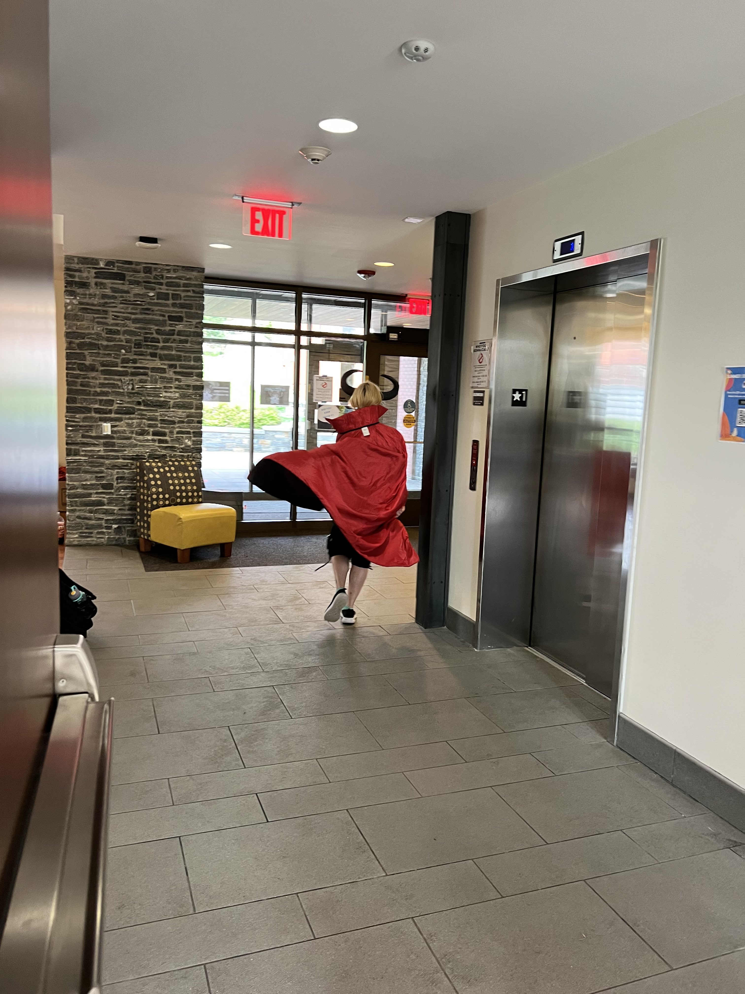 A girl dressed up as a devil.